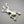 Load image into Gallery viewer, Silver frog pendant on a dark gray background