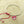 Load image into Gallery viewer, Enamelled pink flying heart bead bracelet - Makers & Providers