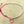 Load image into Gallery viewer, Enamelled pink flying heart bead bracelet - Makers & Providers
