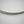 Load image into Gallery viewer, Silver twisted necklace on a gray background