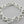 Load image into Gallery viewer, Silver chain bracelet on a gray background