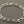 Load image into Gallery viewer, Silver chain bracelet on a gray background