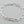 Load image into Gallery viewer, Silver chain bracelet on a gray background