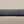 Load image into Gallery viewer, Close-up of a blue braided leather bracelet on a gray background