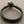 Load image into Gallery viewer, Green braided bracelet on a gray background
