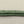 Load image into Gallery viewer, Close-up of a green braided rope on a gray background