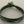 Load image into Gallery viewer, Green braided bracelet on a light gray background