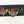 Load image into Gallery viewer, Enamelled yellow, blue, red flying heart stud - Makers & Providers