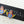 Load image into Gallery viewer, Enamelled yellow, blue, red flying heart stud - Makers & Providers