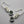 Load image into Gallery viewer, Reef knot drop earring - obsidian & silver - Makers & Providers