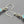 Load image into Gallery viewer, Reef knot drop earring - turquoise & silver - Makers & Providers