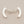 Load image into Gallery viewer, Silver curved earrings on a gray background