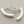 Load image into Gallery viewer, Silver half-circle earrings on a gray background