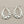 Load image into Gallery viewer, Silver hoop earrings on a dark gray background