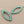 Load image into Gallery viewer, Teardrop-shaped earrings with turquoise beads on a gray background
