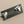 Load image into Gallery viewer, Silver fish-shaped pins on a black card with 'Maker Provide' branding on a gray background