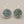 Load image into Gallery viewer, Pair of silver earrings with turquoise stones on a gray background