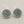 Load image into Gallery viewer, Pair of silver earrings with turquoise stones on a gray background