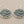 Load image into Gallery viewer, Pair of silver earrings with turquoise stones on a gray background