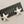 Load image into Gallery viewer, Starfish-shaped earrings on a card with 'Makers & Providers' text against a gray background