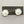 Load image into Gallery viewer, Silver sunflower-shaped earrings, against a gray background.