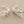 Load image into Gallery viewer, Silver branch-like earrings on a dark gray background