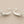 Load image into Gallery viewer, Pair of silver branch-like earrings on a gray background