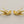 Load image into Gallery viewer, Pair of gold branch-shaped earrings on a gray background
