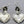 Load image into Gallery viewer, Silver heart-shaped earrings on a gray background