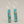 Load image into Gallery viewer, Turquoise and gold rectangular earrings on a gray background
