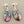 Load image into Gallery viewer, Pair of earrings with colorful stone drops on a gray background