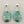 Load image into Gallery viewer, Turquoise stone earrings with silver posts on a gray background