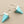 Load image into Gallery viewer, Turquoise triangle earrings with silver hooks on a gray background