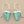 Load image into Gallery viewer, Turquoise triangle earrings with silver hooks on a gray background