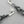 Load image into Gallery viewer, Torn spiral drop earring - oxidized sterling silver - Makers & Providers