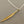 Load image into Gallery viewer, Long tea leaf pendant - gold on 55cm silver chain