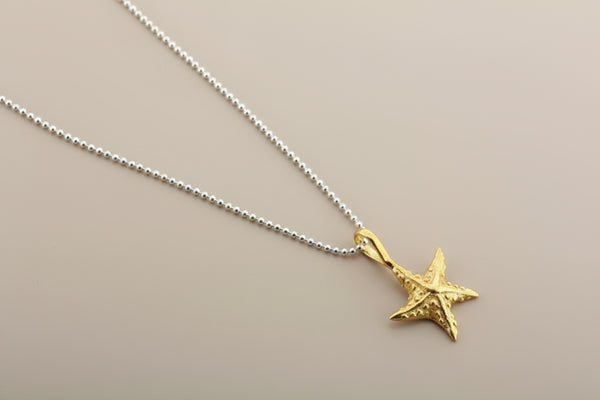 Golden starfish pendant on 45cm ball chain