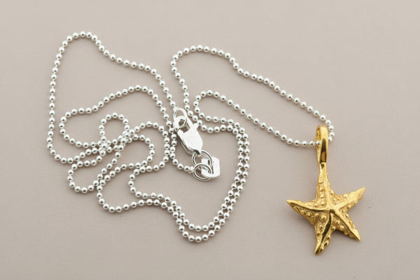 Golden starfish pendant on 45cm ball chain