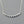 Load image into Gallery viewer, Silver necklace with a textured bar pendant on a gray background