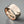 Load image into Gallery viewer, Copper ring with a textured band on a dark grey background