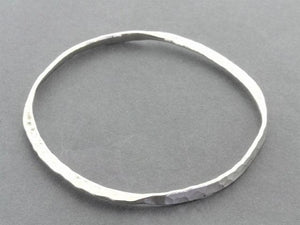 Hammered flattened bangle - pure silver - Makers & Providers