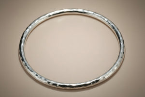 circular battered tubular bangle - sterling silver - Makers & Providers