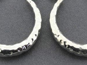 tapering hoop - hammered silver - Makers & Providers
