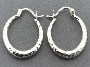 tapering hoop - hammered silver - Makers & Providers