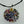 Load image into Gallery viewer, flower/resin pendant - circle on black silk - Makers & Providers