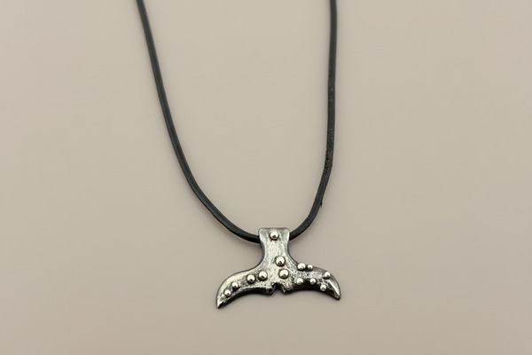 Whale tail necklace - sterling silver on adjustable leather thong