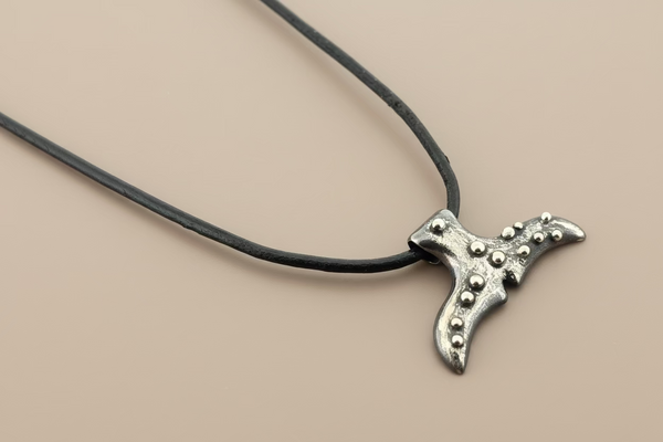 Whale tail necklace - sterling silver on adjustable leather thong