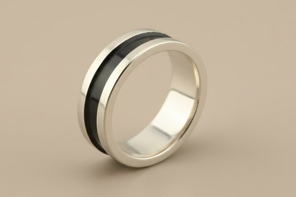 Silver band with wide oxidised groove