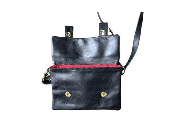 opened leather shoulder bag