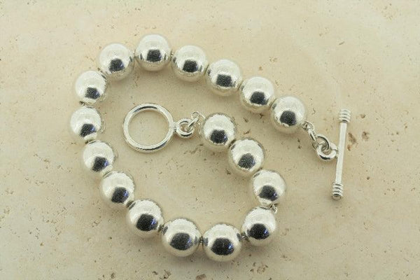 #10 round bead bracelet - sterling silver - Makers & Providers